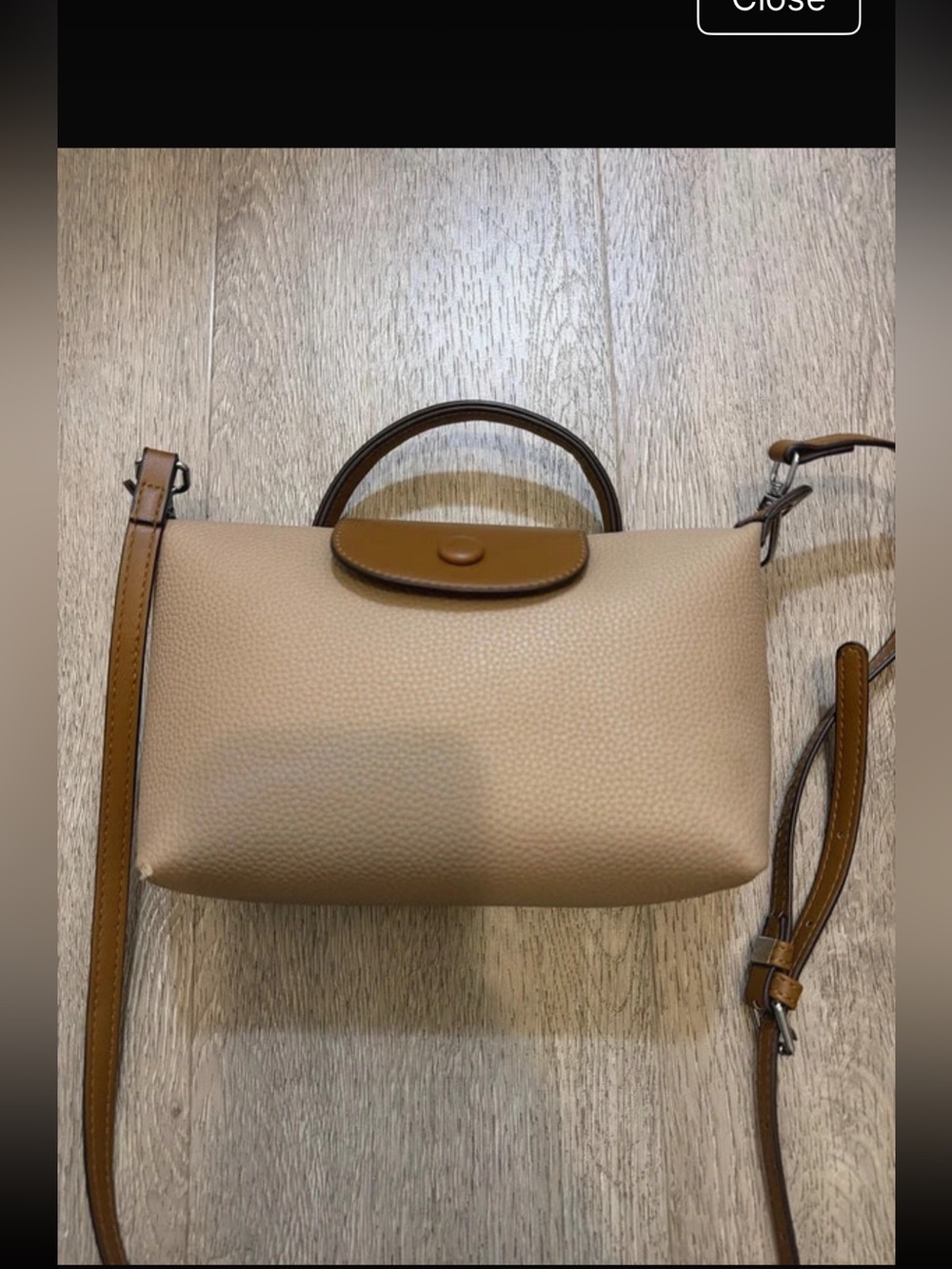 Mini cross body purse Mini crossbody purse used a few times has a little scratch